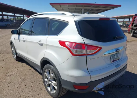 2014 Ford Escape Titanium z USA, uszkodzony, nr VIN 1FMCU0JX2EUE46868